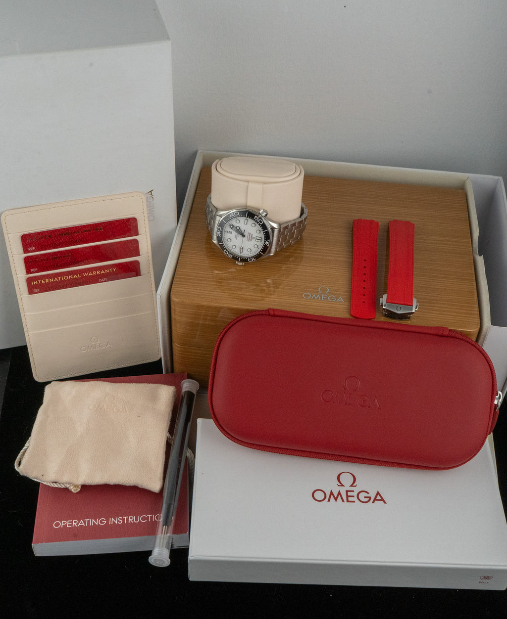 Omega Seamaster Diver 300M 210.30.42.20.04.001 White Dial + OEM Red Rubber Full Set